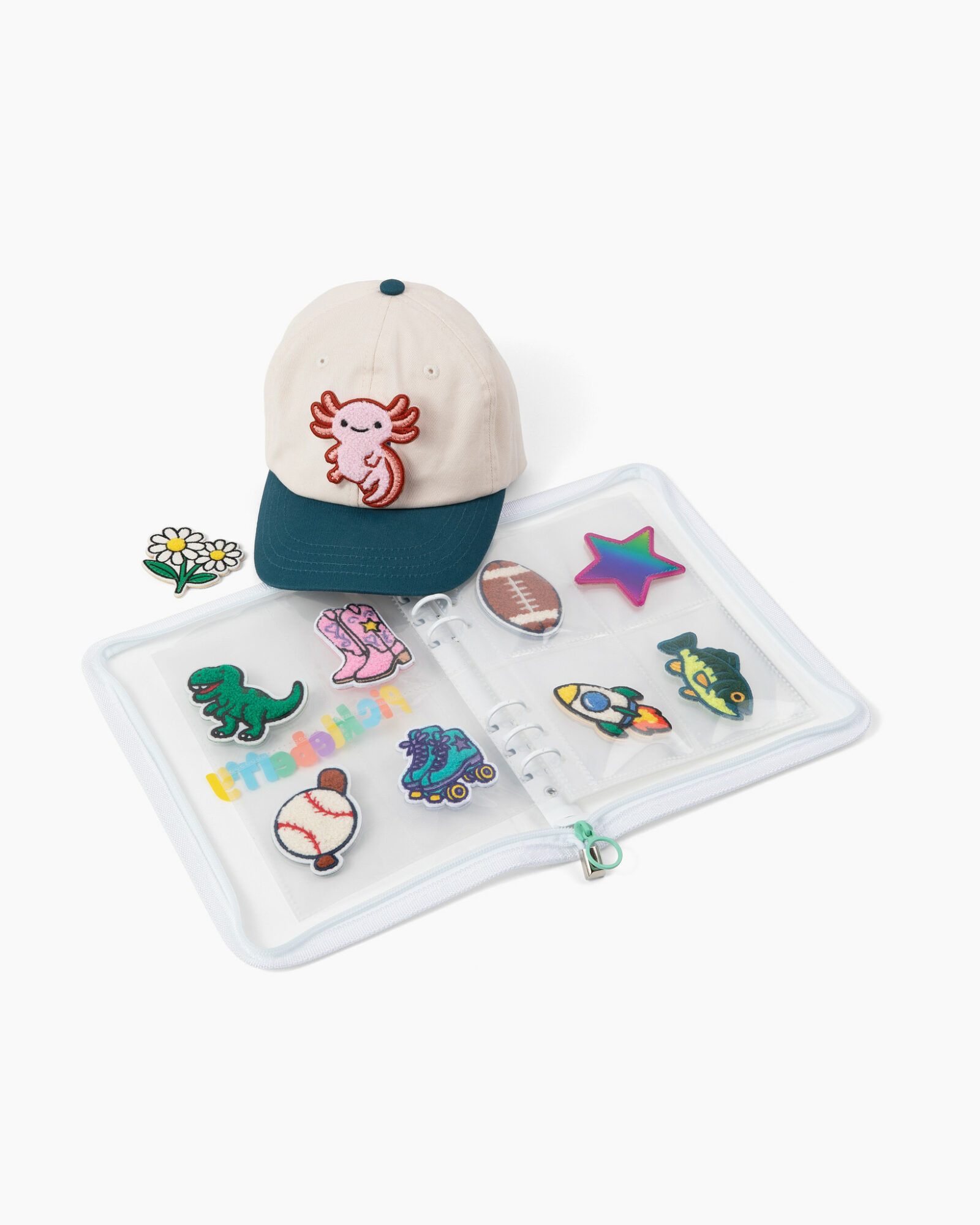 Cap with a tiger face, colorful patches, and stickers of animals, stars, and a rainbow on a white background.