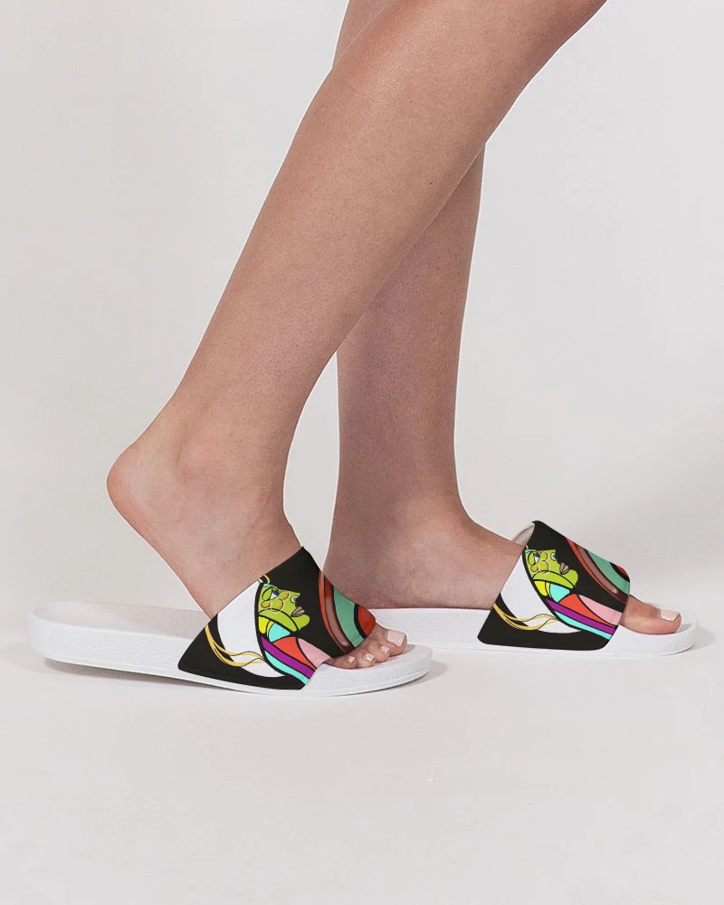 Person wearing colorful slide sandals with a black base, standing on a plain white background.