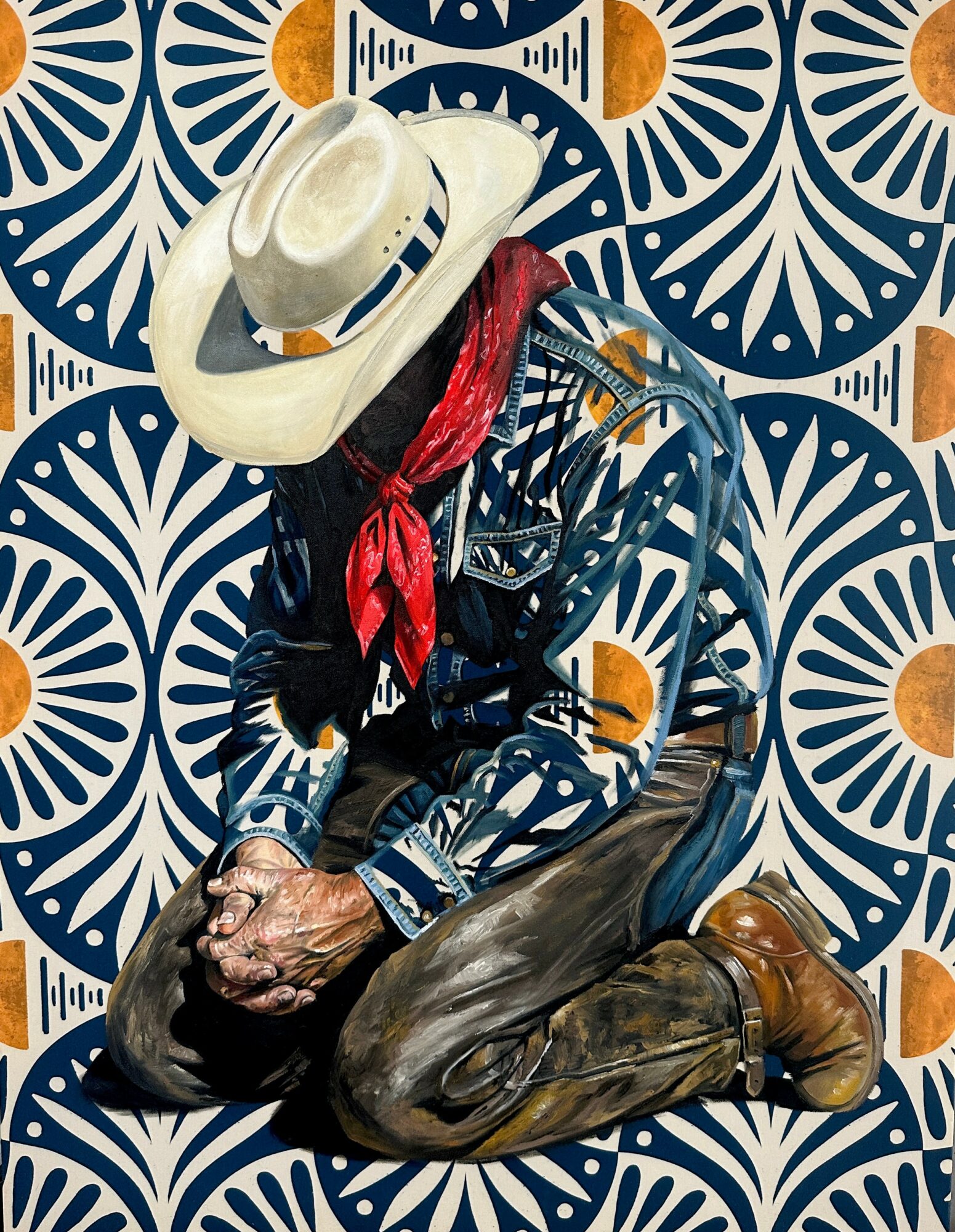 Person dressed in cowboy attire, wearing a hat and red bandana, kneeling with a dog against a patterned background.