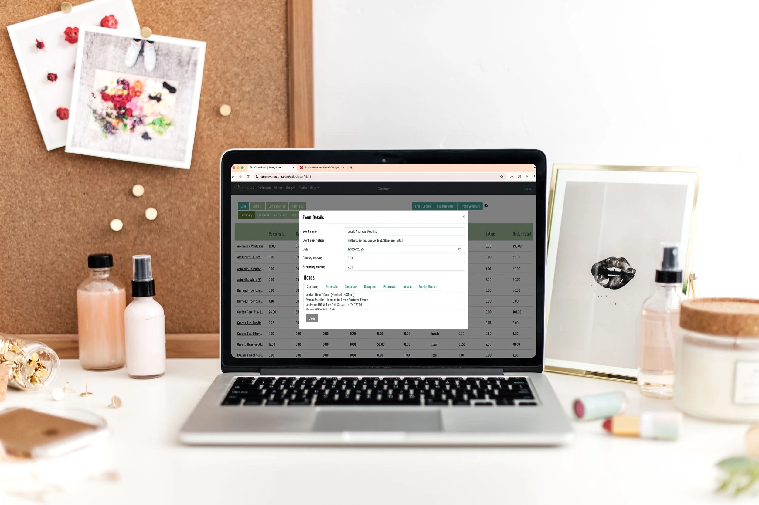 Laptop on desk with bottles, a corkboard with photos, and a mirror, in a bright workspace.