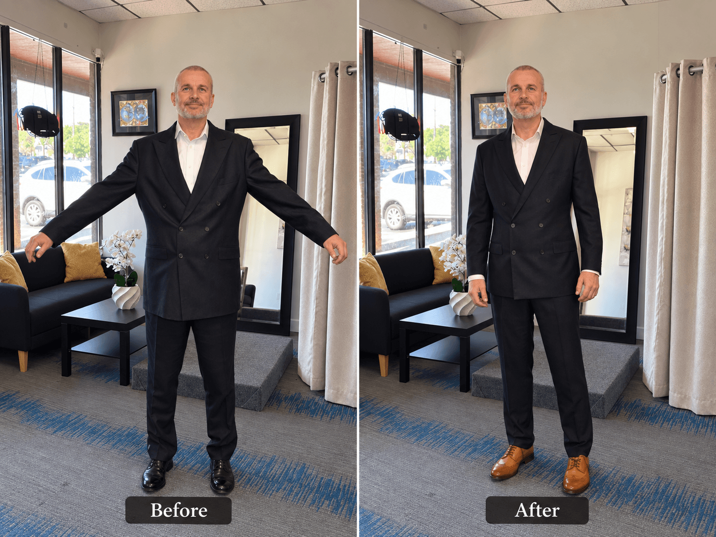 Man in a suit standing with arms outstretched indoors, with a sofa and window behind him.